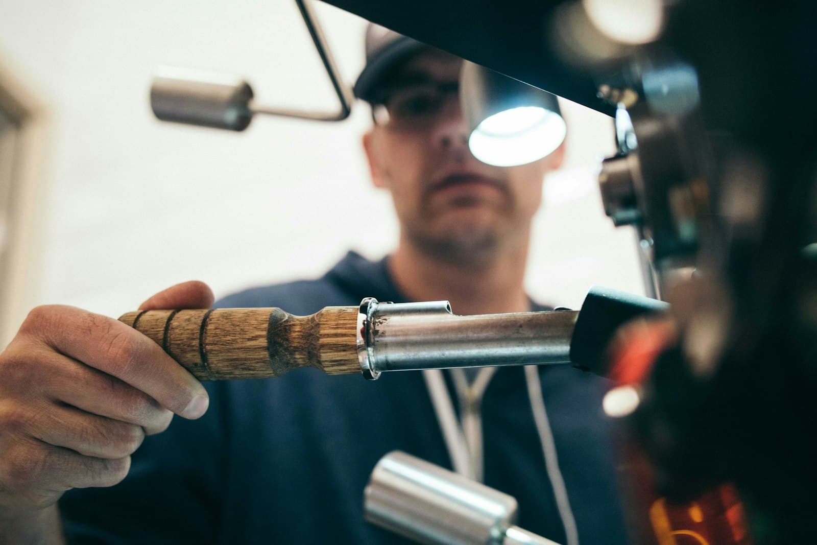 Craftsperson carefully finishing a precision-made object